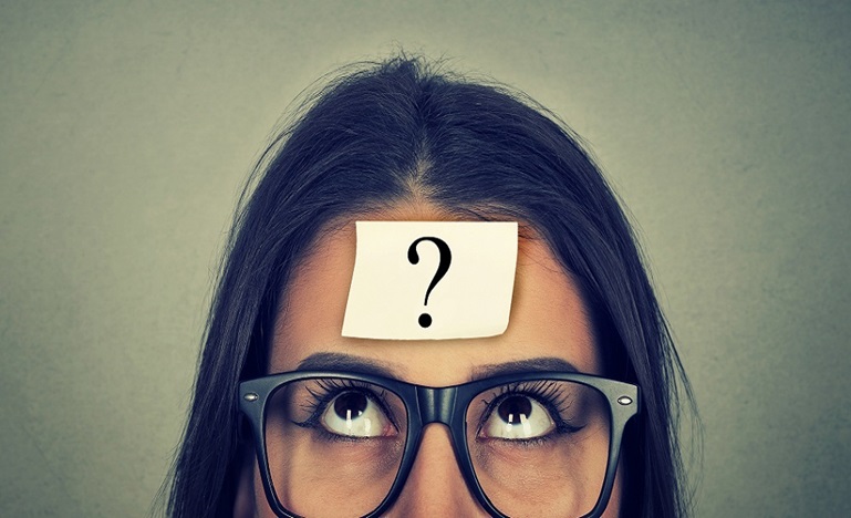 Woman with a question mark on forehead